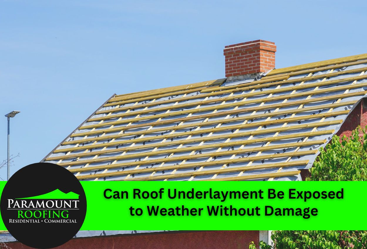 Roof construction showing exposed wooden underlayment battens with brick chimney