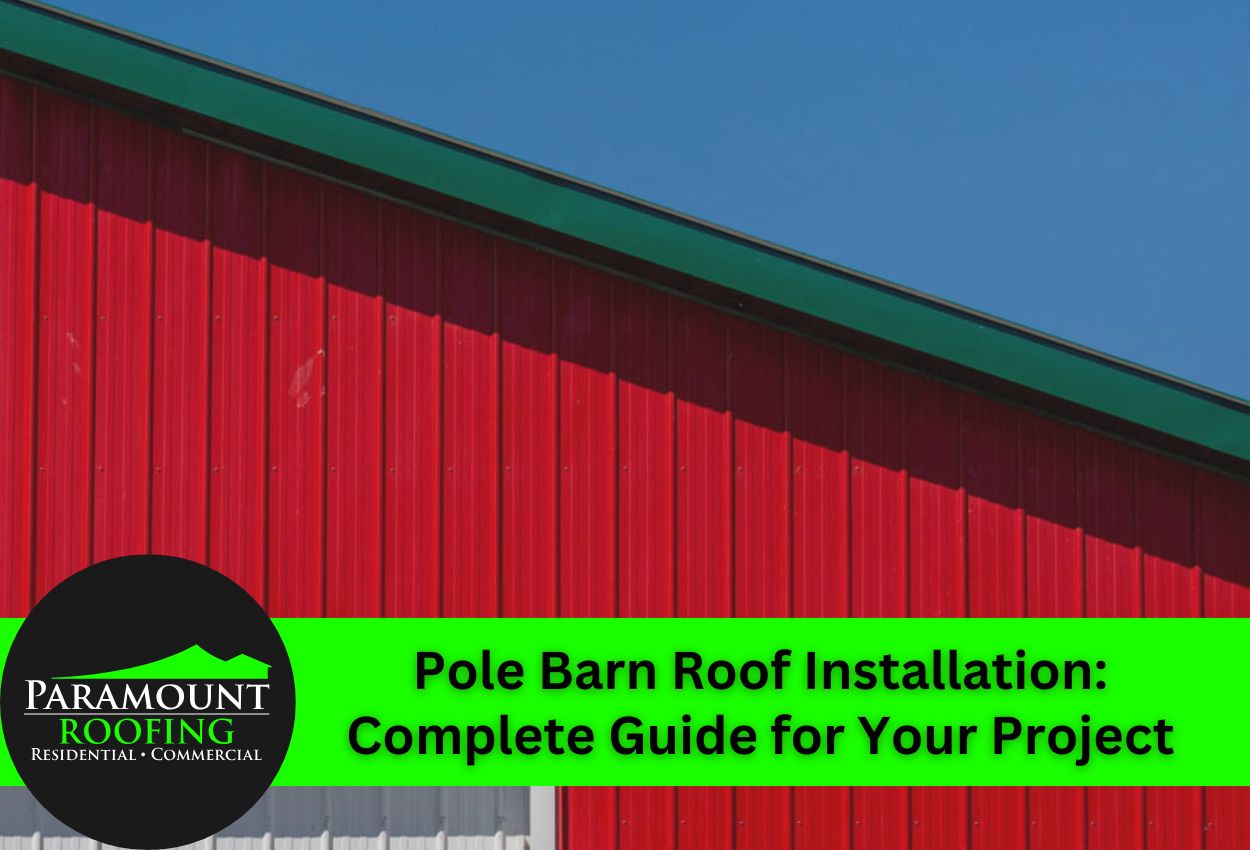 Red pole barn roof against a clear blue sky for installation guide