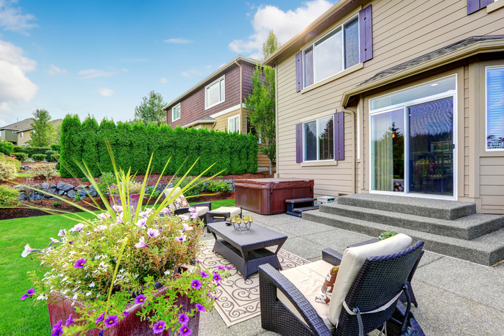 Beautiful backyard patio with seating and garden view