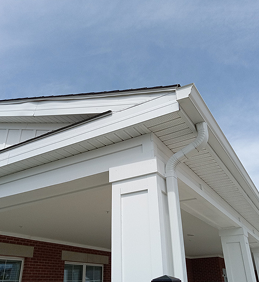 Modern white house porch with detailed roof architecture