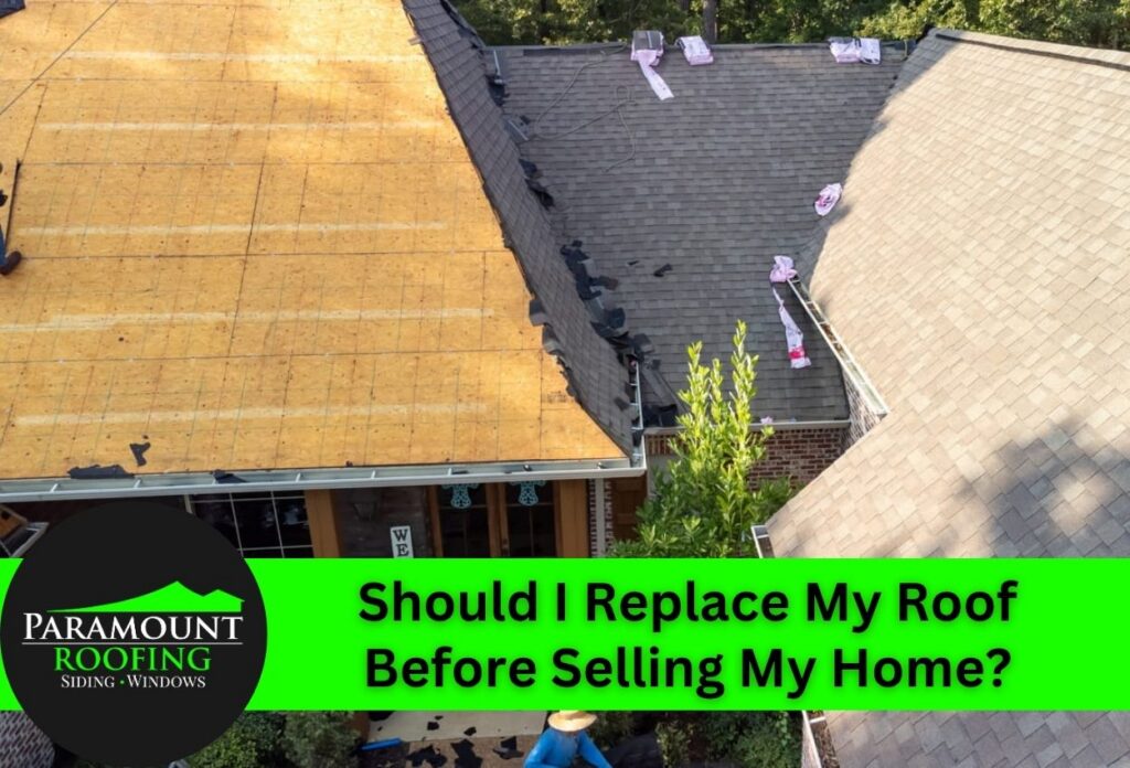 Overhead view of a partially replaced roof with different shingles.